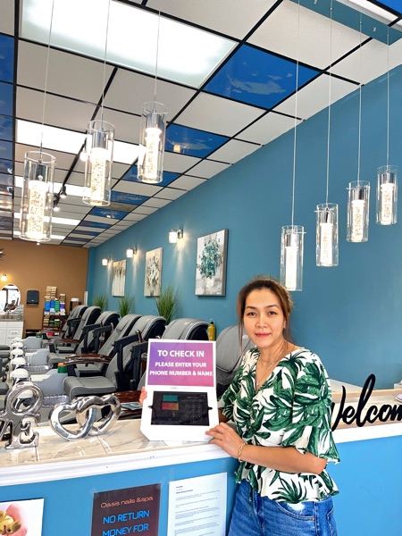 Fastboy Marketing customer at a salon front desk